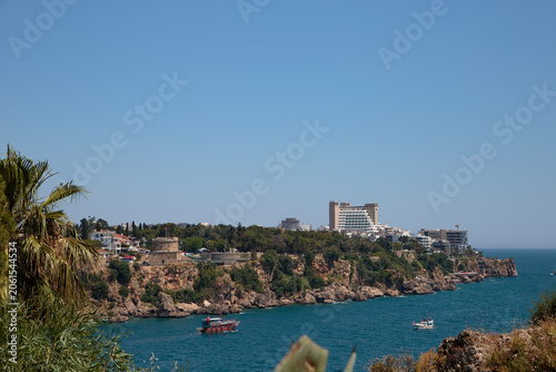 Bild auf Leinwand Panorama of the Antalya coastline with hotels on limestone cliffs