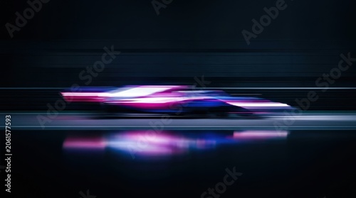Sleek professional race car speeds across a dark track at night creating a vibrant motion blur effect with brilliant pink and blue neon light streaks captured in this dynamic photograph.