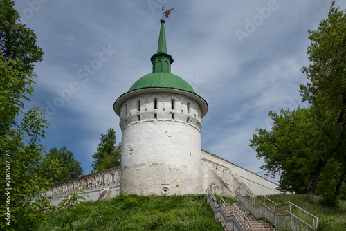 Fotografie A corner tower and a fragment of an ancient fortress wall