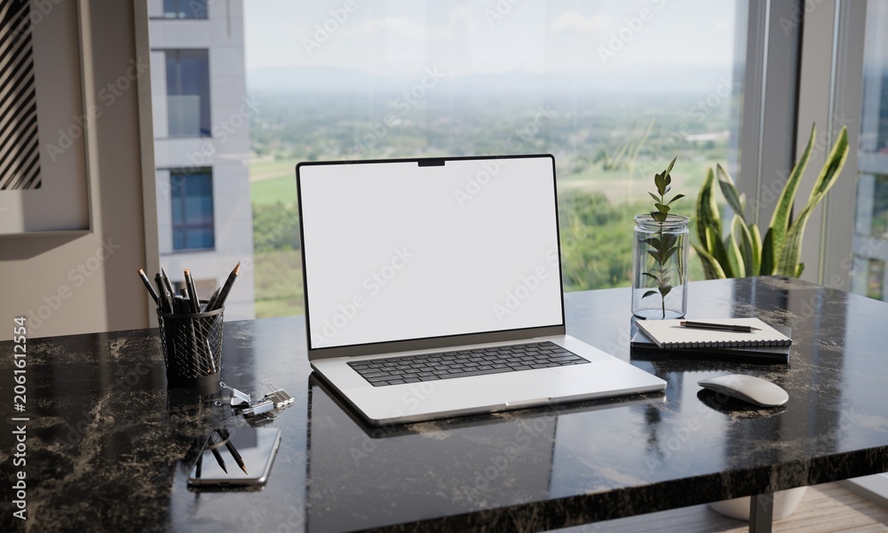 Obraz premium Laptop with Blank Screen on Modern Office Desk - Mockup City View