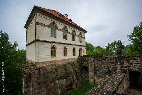 Exterior of Valdstejn Castle (Hrad Valdstejn) in Hruba Skala, Bohemian Paradise (Cesky raj), Czech Republic. historic sandstone castle exterior overlooking valley forest landscapes