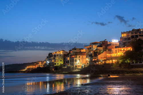 Photography Taghazout village and beach with lighting on at blue hour, summer surfing vacati