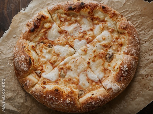 Freshly baked white pizza with mozzarella cheese slices