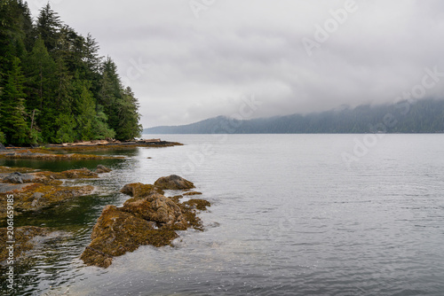 Port San Juan Inlet Landscape Port Renfrew. Rock shoreline in Port San Juan, Port Renfrew, British Columbia, Canada.
