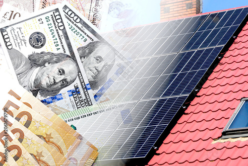 Valokuva Solar panels on residential roof with euro and dollar banknotes