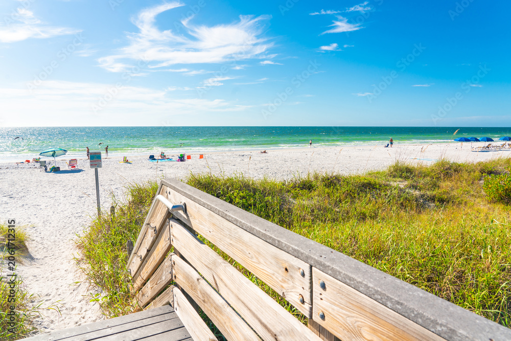 Obraz premium Indian rocks beach with green grass in Florida, USA