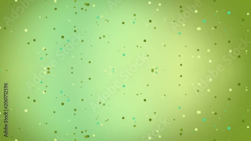 Green background with glittering particles