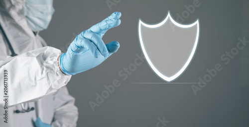 a man taps on a screen with a virtual shield