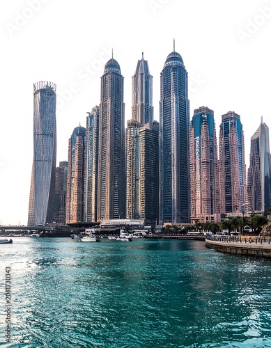 A serene cityscape with sleek skyscrapers along a tranquil waterfront
