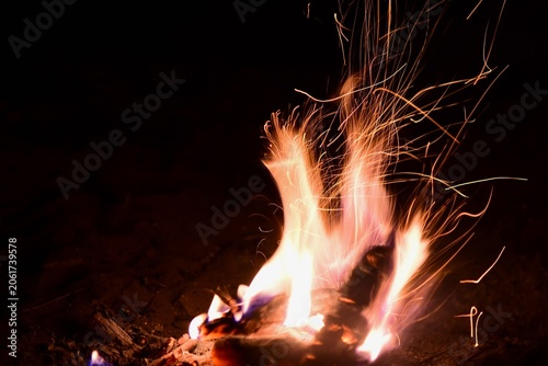 sparks and fire on black background
