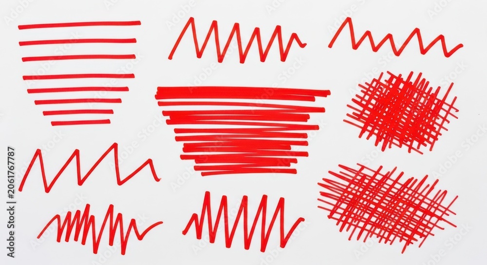 Obraz premium Set of red handdrawn marker scribbles and lines isolated on white background