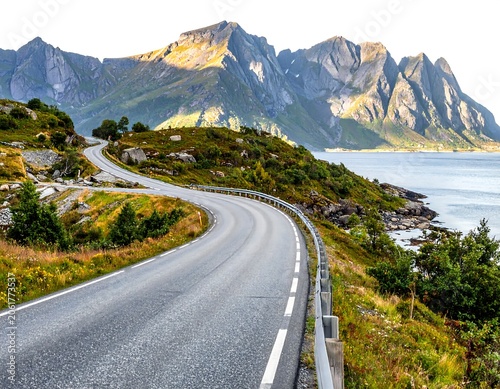 A serene mountain road winds along a rugged coastline