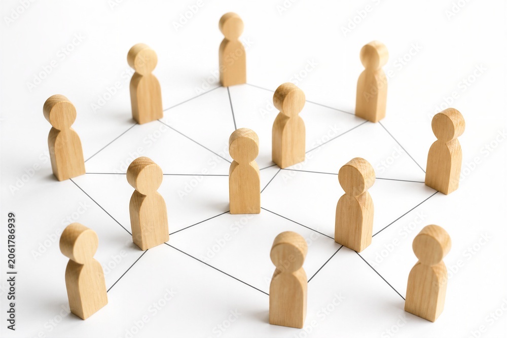 Obraz premium Wooden figurines connected in network on white surface