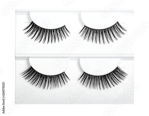 A set of two pairs of false eyelashes in a white plastic packaging