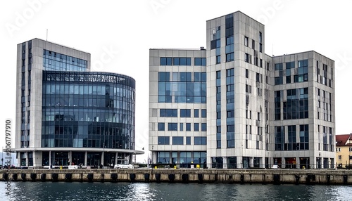 A serene waterfront scene featuring three modern office buildings