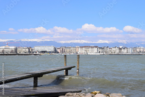Geneva skyline with swiss alps on lake geneva