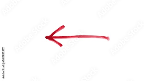 A brush stroke of an arrow pointing to the left