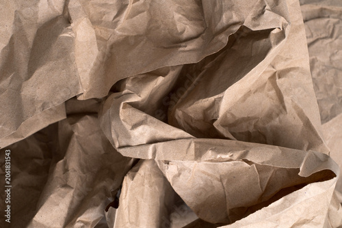 Close-up of crumpled brown kraft paper texture background, sustainable packaging and eco-friendly concept