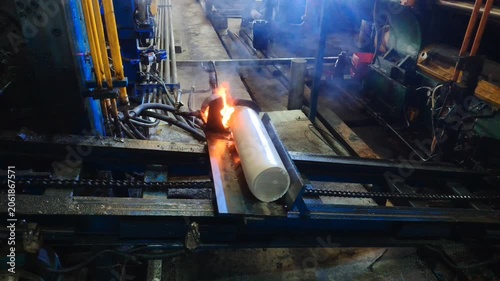 Aluminium billet moving on the carrier