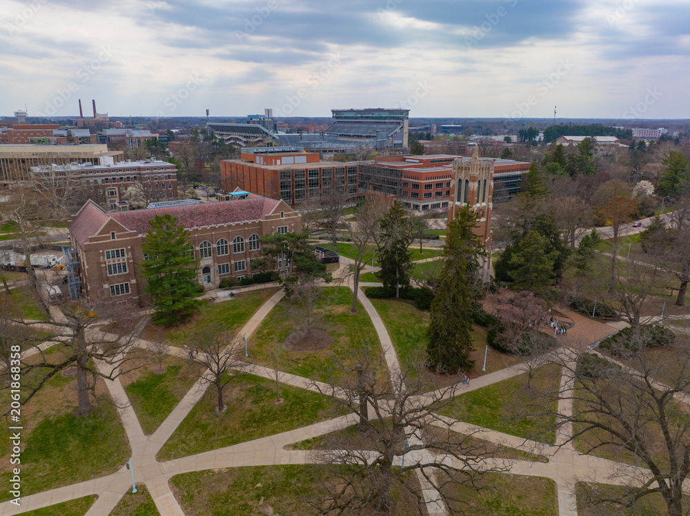 Obraz premium Beaumont Tower and MSU Museum aerial view in Michigan State University in East Lansing, Michigan MI, USA. 