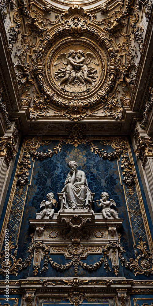 Obraz premium Ornate Baroque architecture, gold decorations, blue interior, statue, religious art