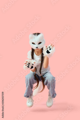 Quadrober girl in cat mask ...