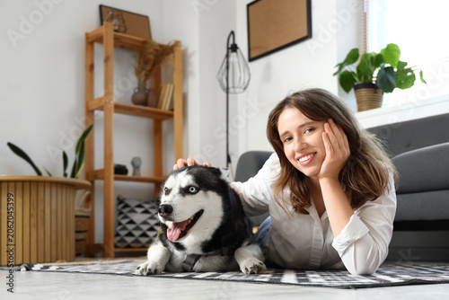 Happy young woman with husk...