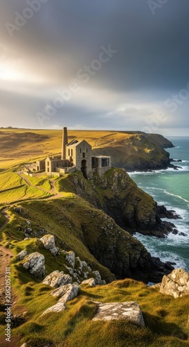 Historic Cornish Tin Mine Ruins on Coastal Cliffside at Sunset.