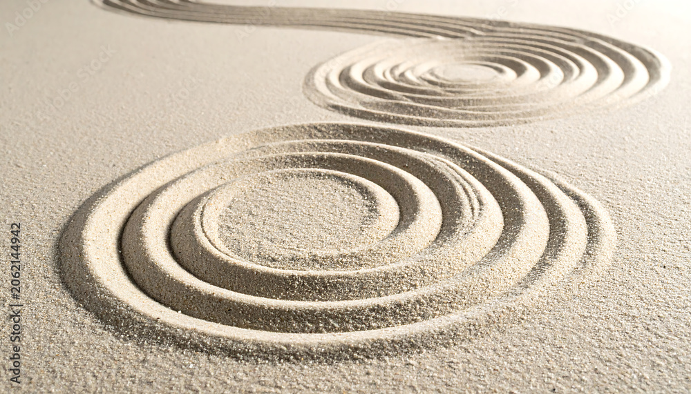 Naklejka premium Intricate Patterns Created in White Sand.