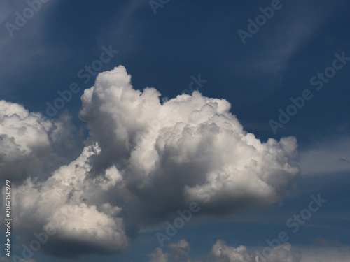 Cumulus clouds, or good weather clouds, appear on sunny days and have a soft, cotton-like appearance with a flat base.