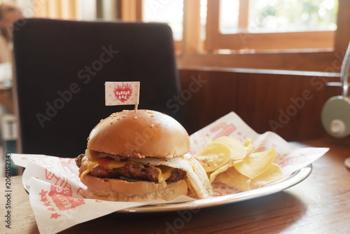 Delicious Gourmet Burger and Crispy Chips Appetizer