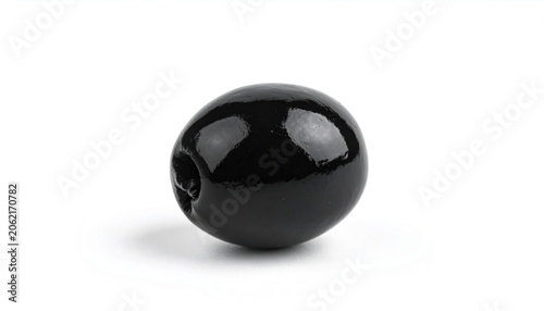Single Black Olive on White Background, Close-Up Studio Shot.