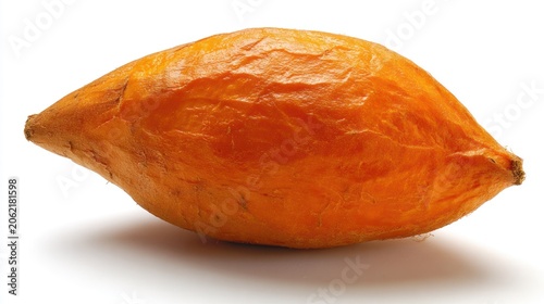 Single orange root vegetable rests isolated against a bright white background