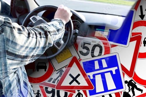 Verschiedene Verkehrsschilder und ein Mann im Auto