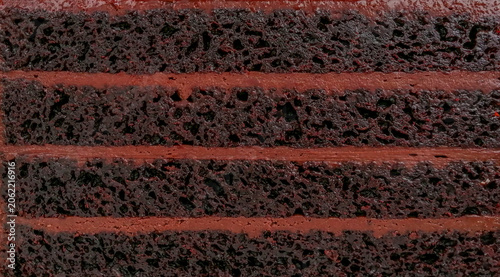Close up four layers of chocolate cake