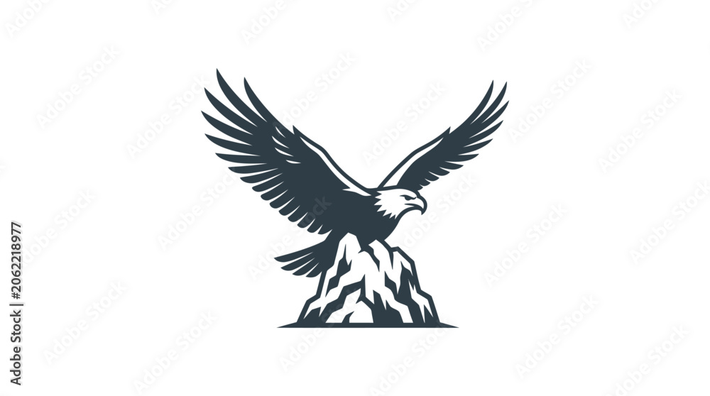 Fototapeta premium A majestic bald eagle perched atop a rocky mountain peak with wings spread wide.