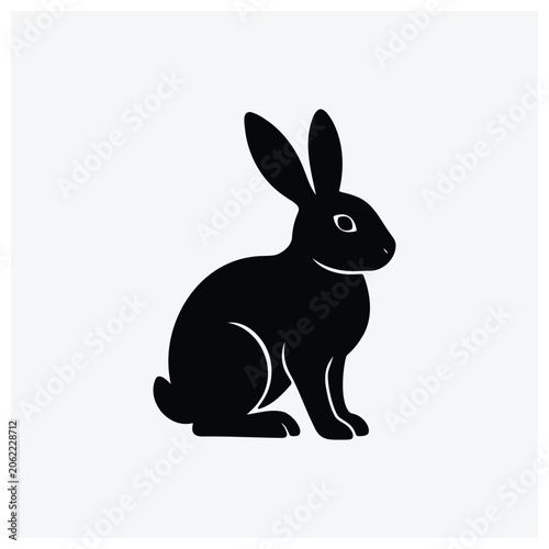 Simple black silhouette of a sitting rabbit.