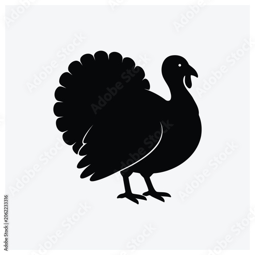 Black silhouette of a standing turkey bird