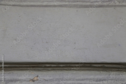 Weathered concrete wall with subtle horizontal lines