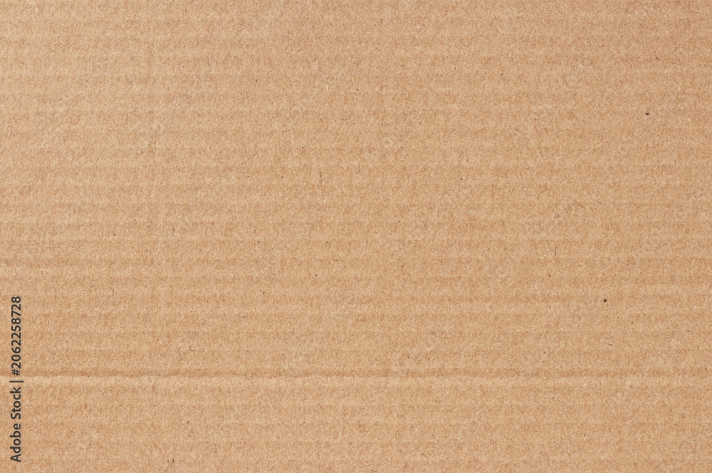 Fototapeta premium Brown cardboard sheet abstract background, texture of recycle paper box in old vintage pattern for design art work.
