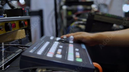 Television director switching live broadcast on video mixer