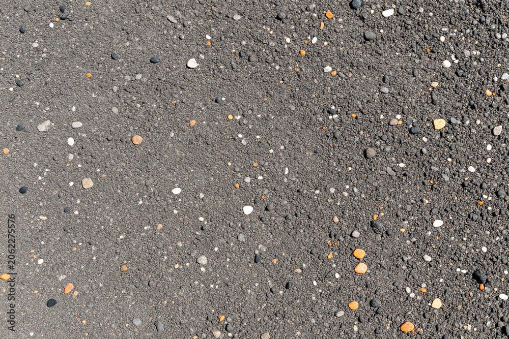 Fototapeta premium a close up of a pile of gravel on the ground