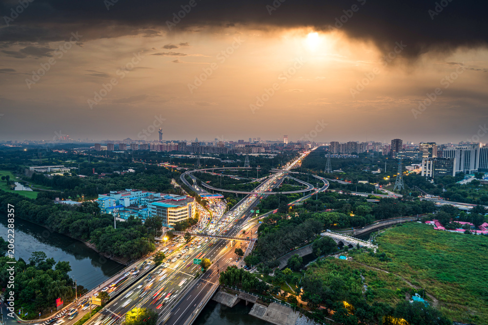 Obraz premium Beijing's Dusk City Transportation Hub: A Modern Urban Three-Dimensional Transportation System