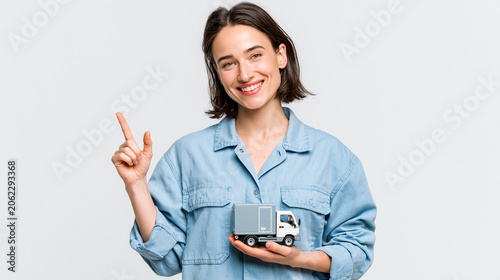 Woman Holding Miniature Tru...