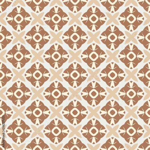 A pattern of brown and white squares. The squares are arranged in a diamond shape. The pattern is repeated over and over again