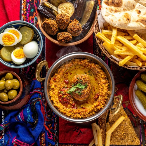 Middle Eastern Food Spread on Colorful Rug