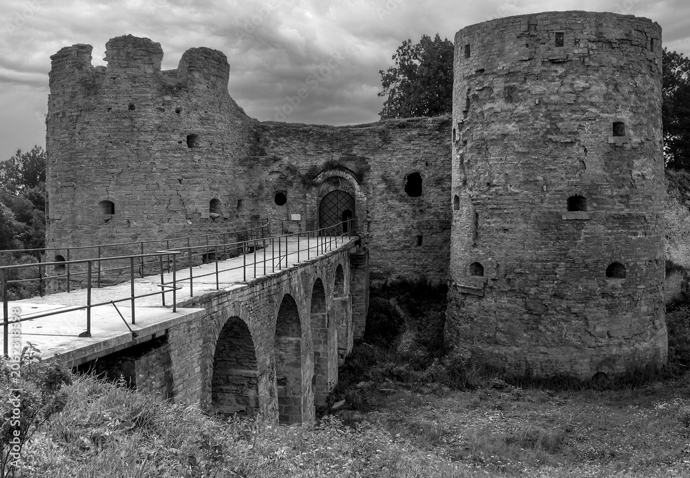 Fototapeta premium Koporye Fortress. A close-up of the bridge and gate towers.