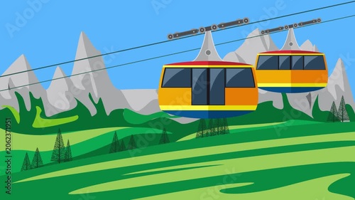 Cable cars moving over a green valley with mountain peaks in the background