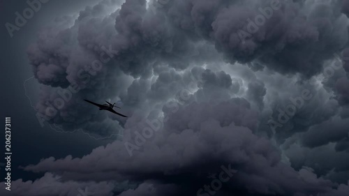 Dark storm clouds fill the sky. Military jet glides as black silhouette. High contrast visual style. Suitable for defense projects. Dramatic atmospheric presence. Ideal for military documentaries