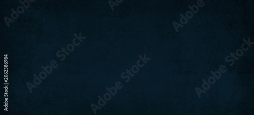 Cuadro en lienzo Abstract grunge texture with deep blue gradient and dark overlay background